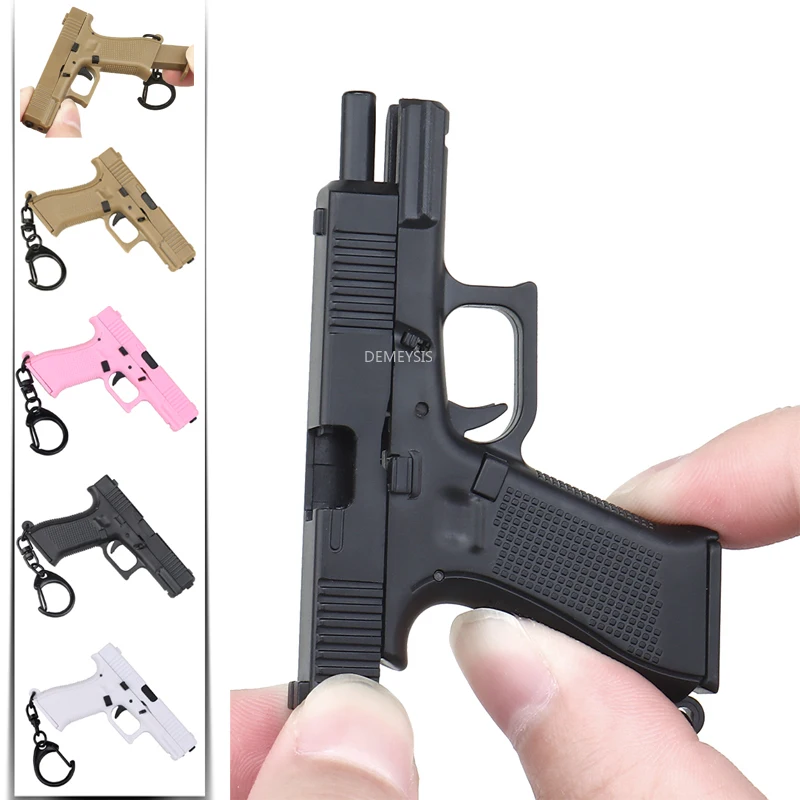 Mini Pistols Shape Keychain Re - огляд і ціна Home Decor Magazine