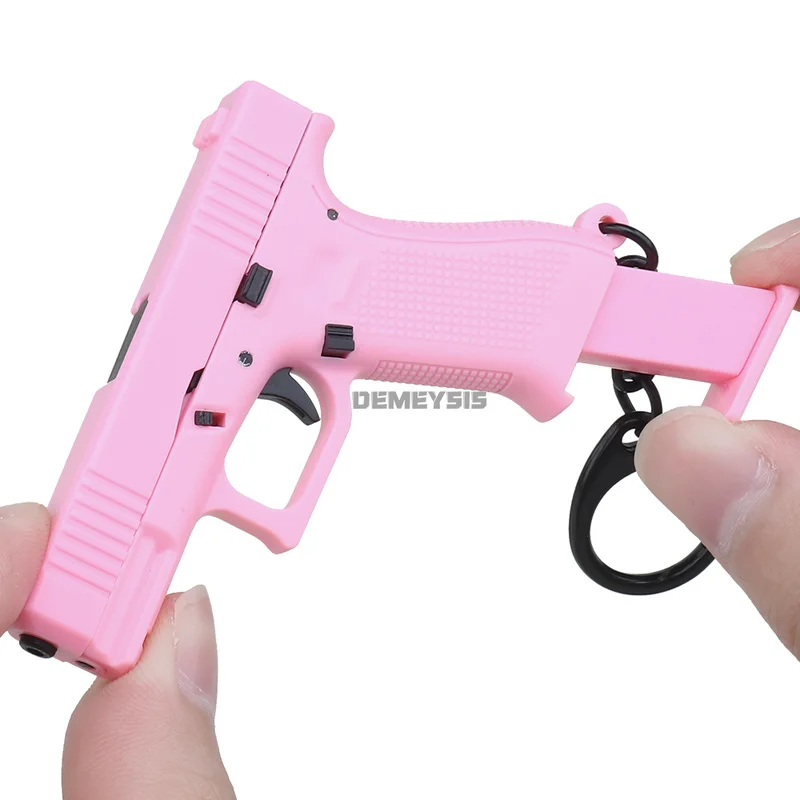 Mini Pistols Shape Keychain Re - огляд і ціна Home Decor Magazine